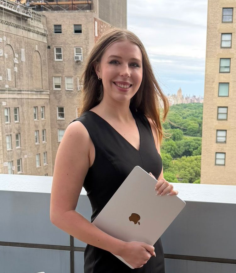 Grace Dunn on a New York City rooftop — available for a free ACT tutoring strategy call through Crownridge Coaching